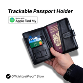Trackable passport holder with a passport and cards, held by a hand, on a white background.